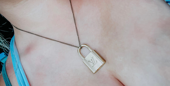 Vintage Louis Vuitton Lock Pendant Selected by Anna Corinna | Free People
